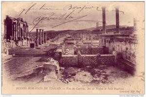 CPA AFRIQUE ALGERIE TIMGAD RUINES ROMAINES VOIE DU CAPITOLE ARC DE TRAJAN ET PETIT PANTHEON