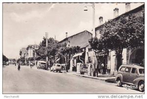 ALGERIE.TIZI OUZOU.LA GRANDE RUE AUTOMOBILE ET POMPE A ESSENCE TOTAL