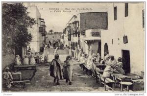Carte Postale Ancienne Algérie -  Biskra. Rue des Ouled Naïls et Cafés Maures
