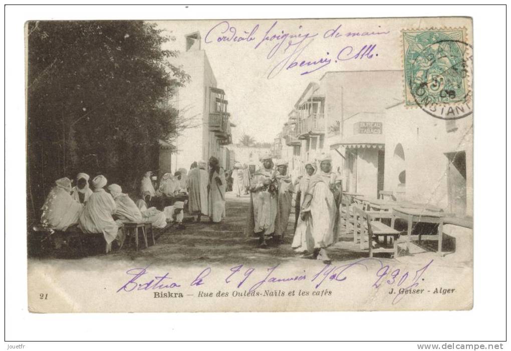 CPA BISKARA RUE DES OULEDS-NAILS ET LES CAFES (ALGERIE)