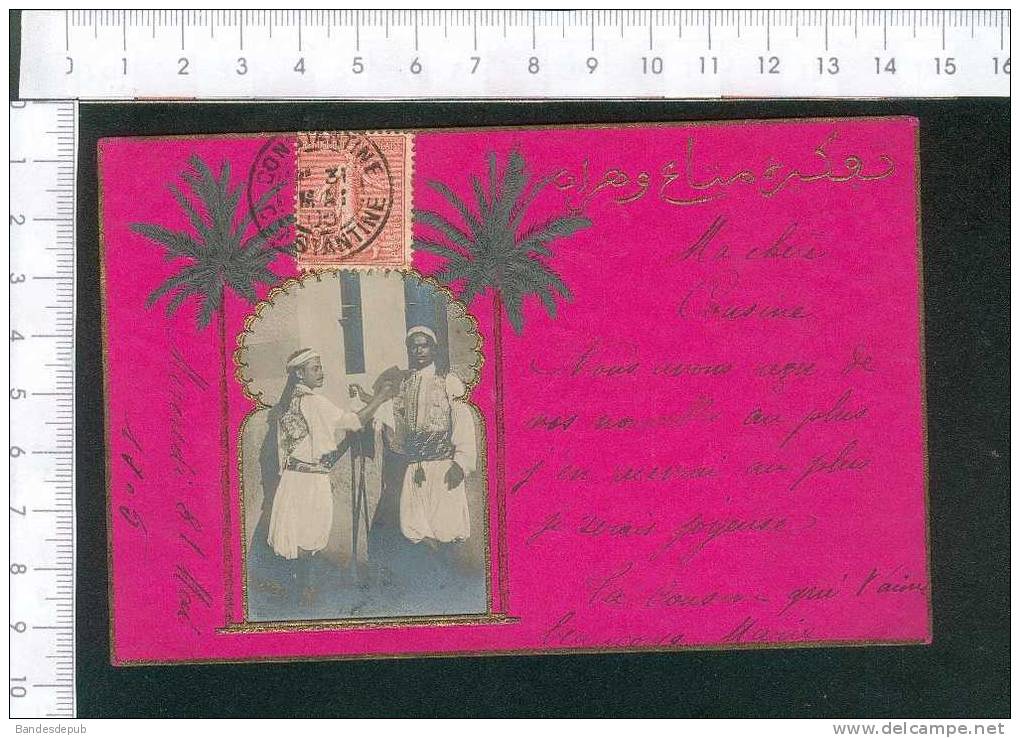 très belle carte gaufrée avec palmiers et photo animée cachet de Constantine écrite en 1905