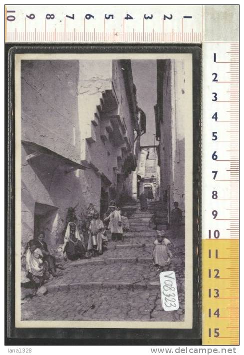 V08323 CONSTANTINE UNE RUE ARABE VICOLI COSTUMI FOLKLORISTICI FOLCLORISTICI BAMBINI