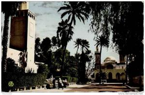 CPA. ANIMEE. LAGHOUAT. L'ANNEXE ET LA CATHDRALE. DATEE 1961. DENTELLEE.
