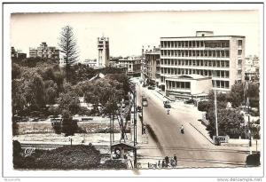 CPSM Mostaganem . L'Avenue Anatole-France (Passage à Niveau)