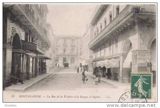 MOSTAGANEM 53 LA RUE DE LA VICTOIRE ET LA BANQUE D'ALGERIE LL (PETITE ANIMATION) 1910