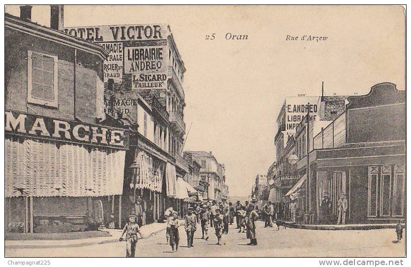 CPA ALGERIE ORAN Rue d'Arzew Commerces Animation 1906