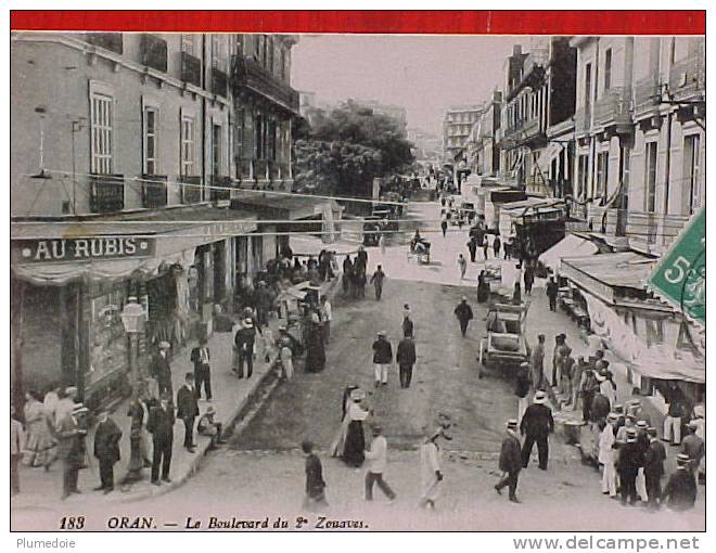 cpa Algérie  ORAN  Le BOULEVARD du 2° ZOUAVES animée , commerces , 1913  voir détails  ** Achat Direct **