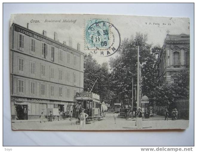 Boulevard Malakoff Tram beau plan pub Chocolat Louis