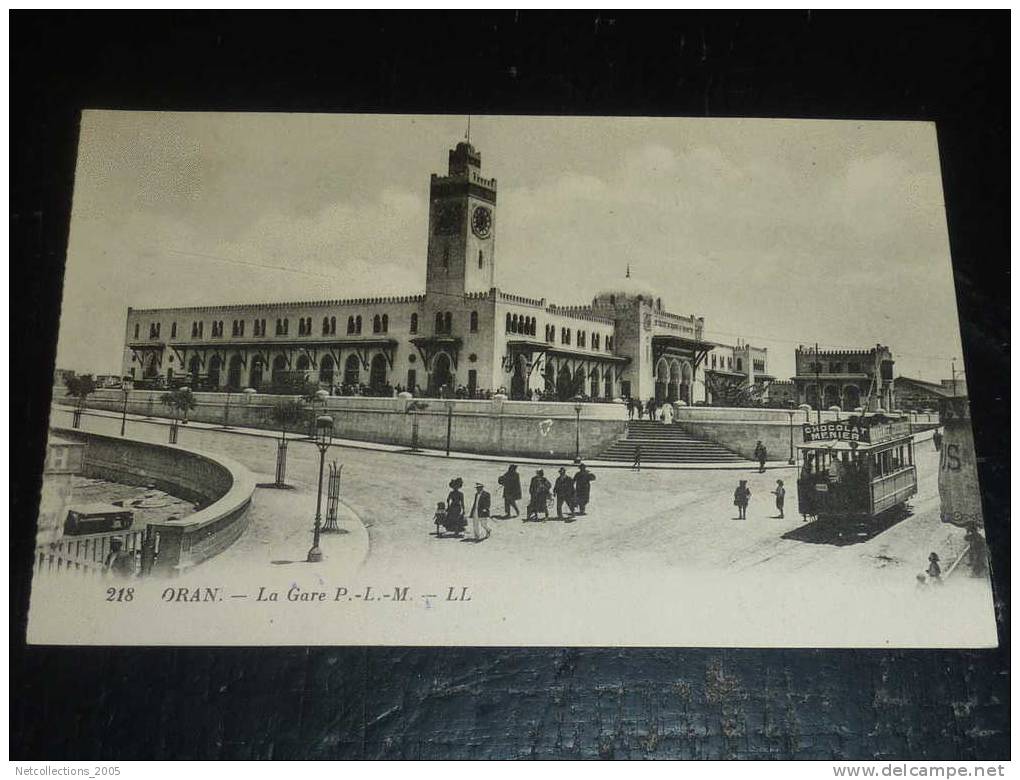 ORAN - LA GARE P-L-M - AVEC UN TRAMWAY PUB CHOCOLAT MEUNIER - AFRIQUE ALGERIE