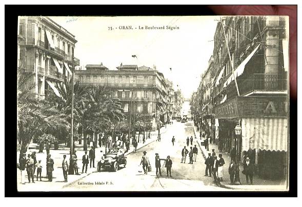 ORAN - 75  Le Boulevard Séguin (Beau plan animé avec automobile ancienne)