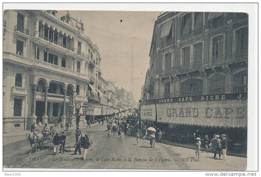 ALGERIE ** ORAN  le boulevard séguin , le café riche , et la banque de l algérie animée . edit . N D . N°167 .