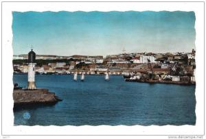 Mostaganem La ville vue de l'entree du port Phare Quai et jetee Bateaux CPSM couleur Format CPA edit Sirecky