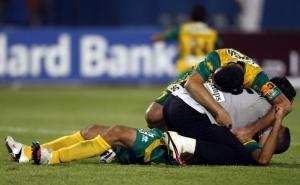 Les joueurs de la JS Kabylie célébrent  leur victoire contre El Ahly