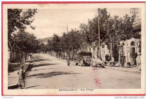 CPA ALGERIE BERROUAGHIA rue d´ ALger ( pompe à essence MOTOGAZ )