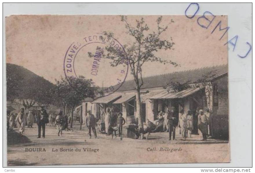 Algérie - BOUIRA - La Sortie du Village (animée facteur? et cachet du  Bataillon  Zouaves Territorial)