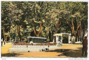 565 - MILIANA - LE ROND-POINT ET L´ENTREE DU JARDIN PUBLIC - CPSM PETIT FORMAT