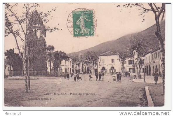ALGERIE . MILIANA . PLACE DE L HORLOGE AVEC LE CAFE LYONNAIS éditeur idéale PS