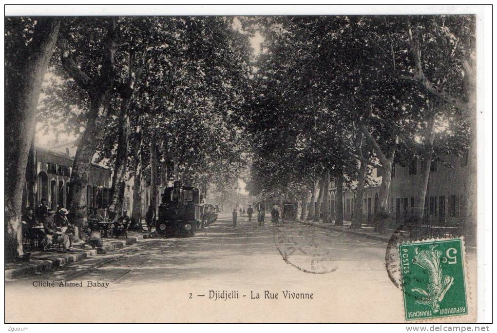 Algerie    Djidjelli -  Rue Vivonne - petit train a touriste ,café terrasse. Animation