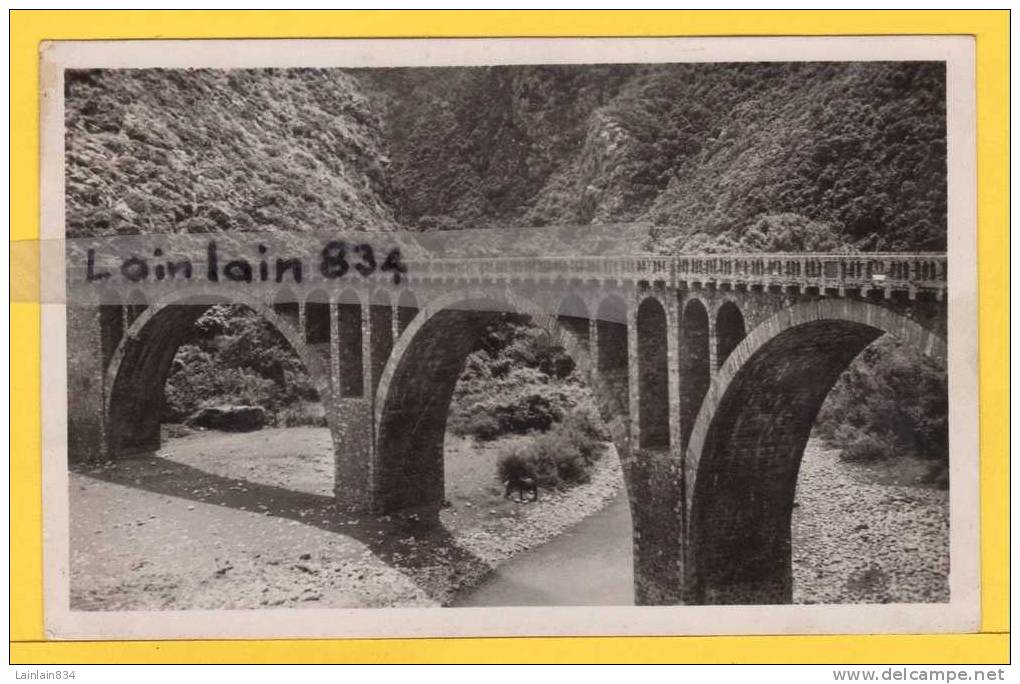 - 1026 -  Route de la Corniche entre BOUGIE et DJIDJELLI -  Le Pont Dar...  écrite, cachet du 30 Mai 1950, bon état.