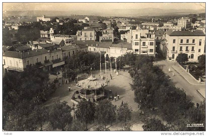 NK-0174-Algérie-Mascara-P lace Gambetta-Pub Byrrh-Kiosque-