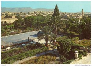 bou-saada.  jardin de l hotel transatlantique et vue generale