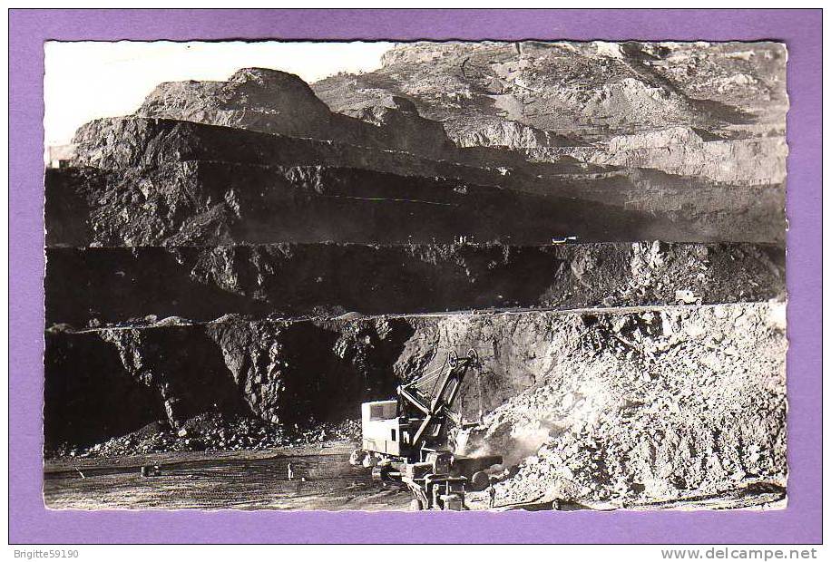 CPSM OUENZA CHANTIER SAINTE BARBE MINES GUE A CABLE EXCAVATRICE CAMION BENNE CATERPILLAR ?