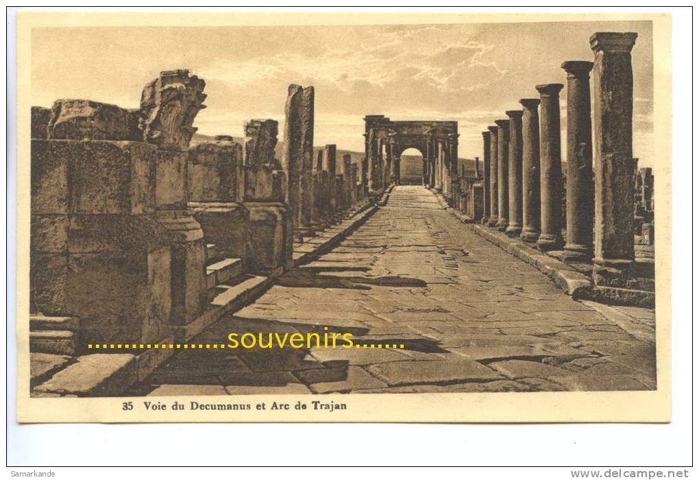CPA   ALGERIE  TIMGAD  Voie du Decumanus et Arc de Trajan - ** prix nets **