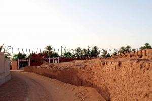 Tourisme Timimoun  Village de Vacances Djenane El Malik dans l\'ancien Ksar de Timimoun supplombant sa palmeraie