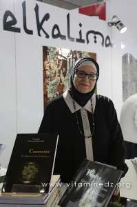 Madame Mansouria Mederreg Belkherroubi au SILA (21e édition) - Stand de l'édition El Kalima