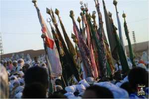 صورة للتقاء اعلام الزيارات لعباد الله الصالحين في الاحتفال بالمولد النبوي- تيميمون