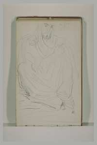 Un arabe assis à terre