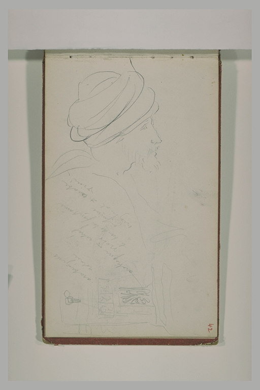 Une tête d'arabe vu de profil, et une façade