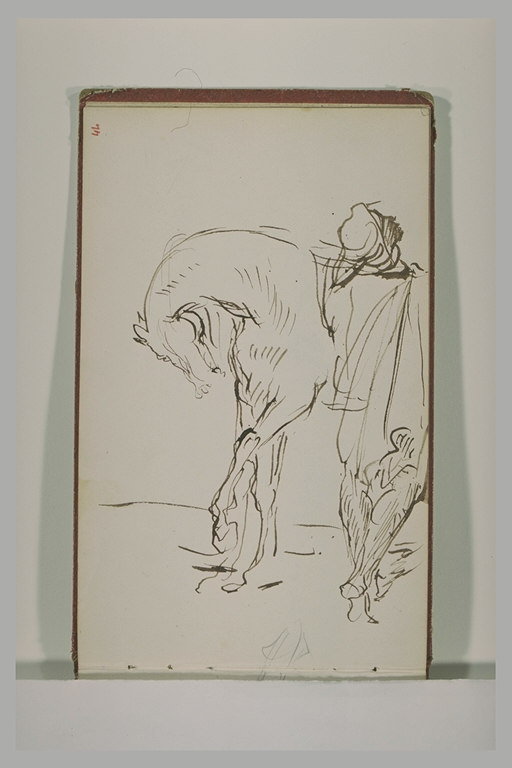 Un arabe vu de dos, devant un cheval