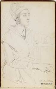 Une arlésienne, assise, vue de trois quarts