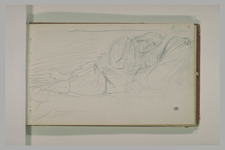 Une femme arabe, allongée, un enfant à ses pieds