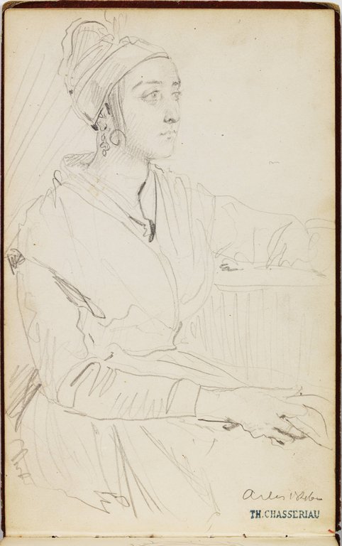 Une arlésienne, assise, vue de trois quarts