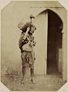 Coco, porteur d'eau philosophe (Image de propagande coloniale)