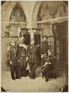 M. le général de brigade Périgot, commandant la subdivision de Bône et son état-major [commandant par intérim de celle de Constantine et ses officiers d'ordonnance dont Lacoste, chef d'escadron d'état-major (assis) (Image de propagande coloniale)