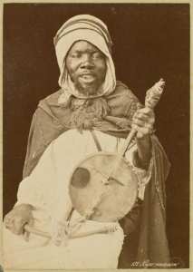 Négro musicien (Image de propagande coloniale)