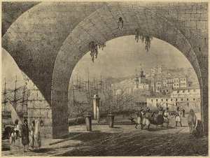 [Alger]. Voûtes de l'Amirauté (Otth) [...]. Port d'Alger. Douane qui servit primitivement de magasins au Génie militaire. Batterie. Premières maisons européenes construites rue de la Marine. Minarets des mosquées Djemaâ-el-Kébir et Djemaâ-el-Kébir. Kasbah. (Image de propagande coloniale)
