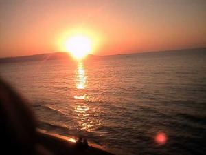 Couché du soleil  au bord de mer