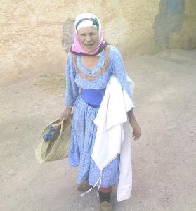 ain madhi. old woman goes shopping