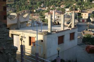 Ighil Igoulmimene UNE PASSERELLE POUR UN CHANGEMENT AU VILLAGE