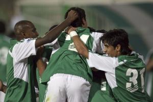Kuwait's AlArabi players celebrate a goal against Algeria's USM