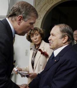 Algeria's president Abdelaziz Bouteflika (R) talks to Britain's Prince