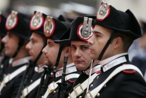 Italian Carabinieri stand guard before of a meeting between
