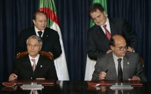 Italy's Energy Minister Pierluigi Bersani (bottom R) and his