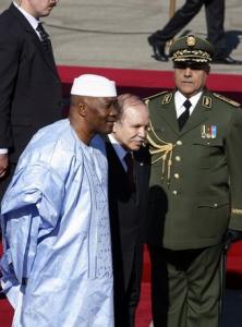 Algeria's President Abdelaziz Bouteflika (R) inspect honour guard with