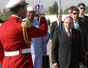 Algerian President Abdelaziz Bouteflika (R) and his Malian counterpart