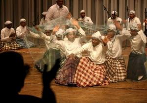 A Saudi Arabian traditional dance team performs during the